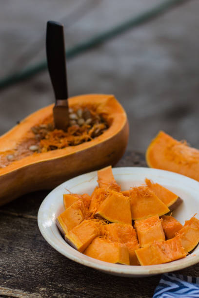 istock pumpkin - cookery chopped pumpkin. food background 1007070344