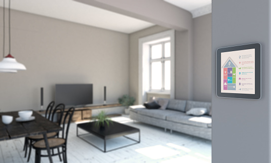 Smart Home Control hanging on the wall. Defocused, blurred living room scene behind the wall. ( 3d render )