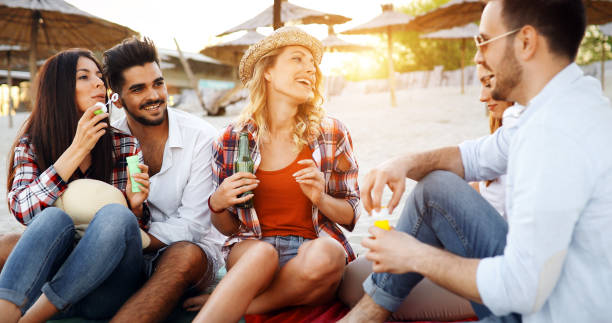 istock Fiends having a great time at the beach 1007097456