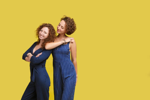 istock Family concept on yellow studio background. 1007098236
