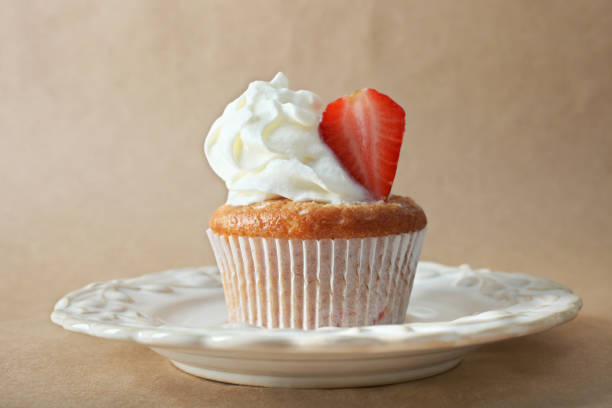 istock Capcake with cream and strawberry 1007104210
