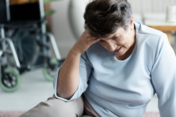 Grandmother with headache fell to the floor in the nursing house Grandmother with headache fell to the floor in the nursing house concussion photos stock pictures, royalty-free photos & images