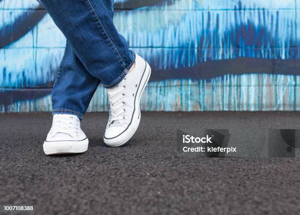 Strike A Pose Stock Photo - Download Image Now - Sports Shoe, Talking, Jeans