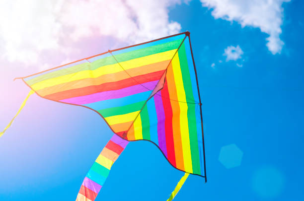 istock colorful flying kite game flying in the sky 1007108394