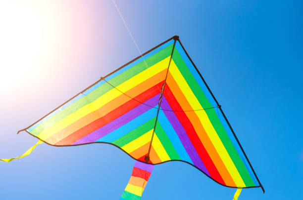 istock colorful flying kite game flying in the sky 1007108462