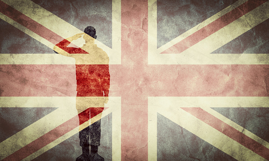 Silhouette of a soldier and The United Kingdom or Union Jack grunge flag. Vintage, retro style. High resolution, hd quality. Item from my grunge flags collection.