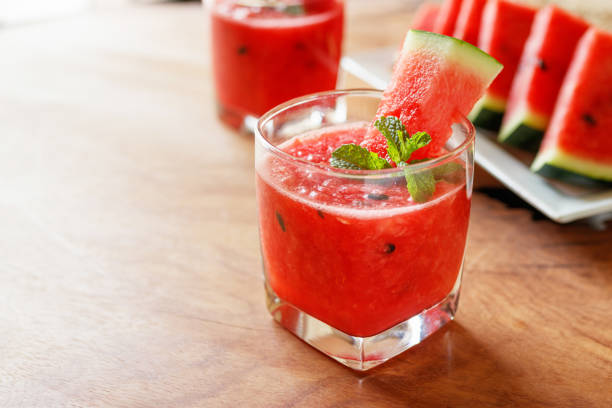 istock Watermelon drink on wooden background. 1007144888