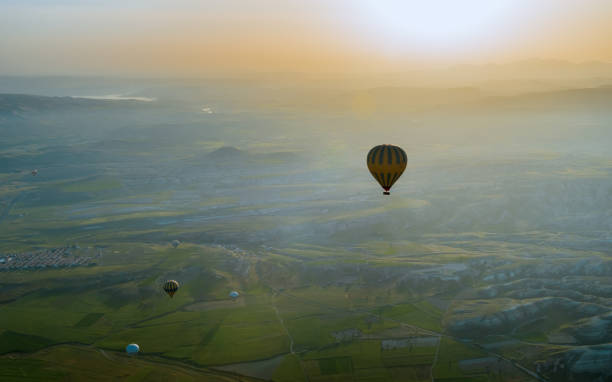 istock Hot air balloons flying over Cappadocia, Turkey 1007144892