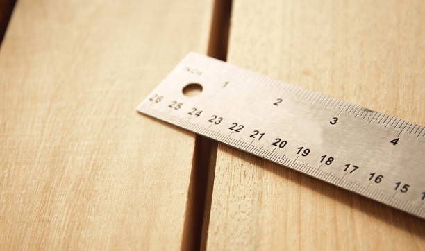 istock metal ruler for measure on wood background 1007151750