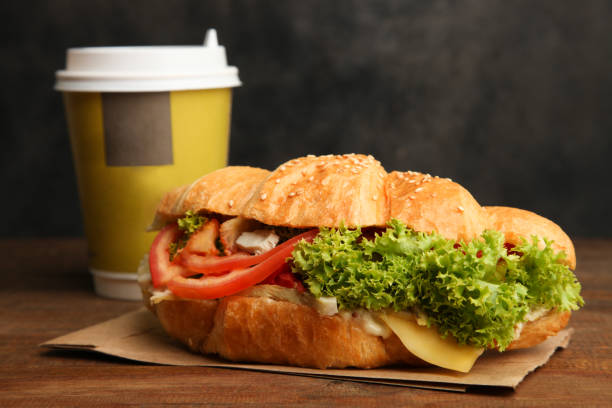 istock Croissant with vegetables and a cup of tea 1007151794