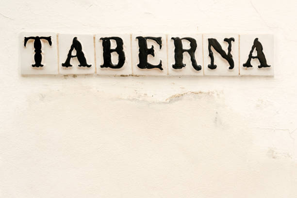 Tavern sign on old Spanish house in downtown Cordoba, Spain