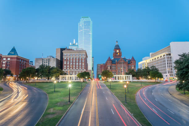 istock Skyline and light trail traffic over Dealey Plaza in Dallas, Texas 1007160586