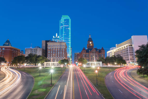 istock Skyline and light trail traffic over Dealey Plaza in Dallas, Texas 1007163964