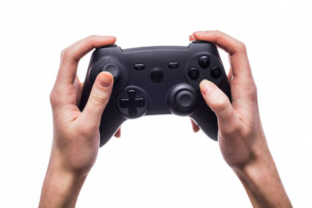 istock woman is playing on the gamepad 1007168750