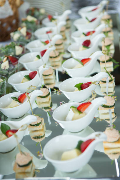 istock Catering Food Wedding Event Table. Buffet line in Wedding. Delicious appetizer close-up. 1007175392