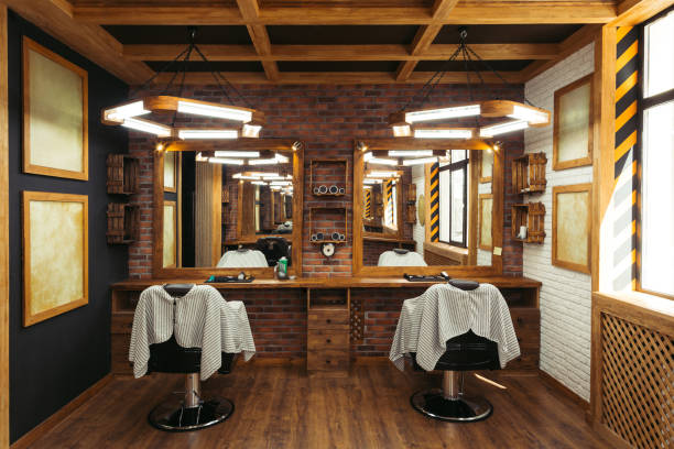 modern empty barbershop interior with chairs, mirrors and lamps modern empty barbershop interior with chairs, mirrors and lamps barber shop stock pictures, royalty-free photos & images