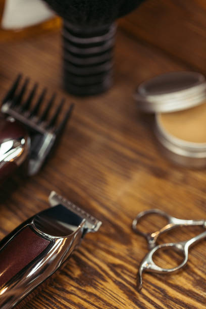 istock close-up view of various barber tools on wooden table 1007175680