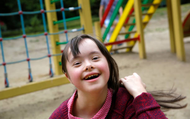 istock Little girl having fun on the playgound 1007179030