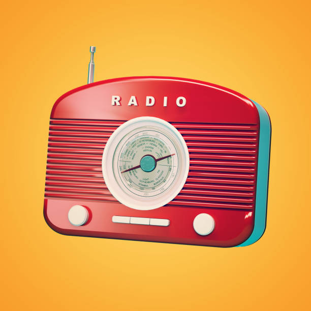 istock Red retro radio on yellow background 1007189210