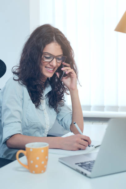 istock Businesswoman with phone 1007189738