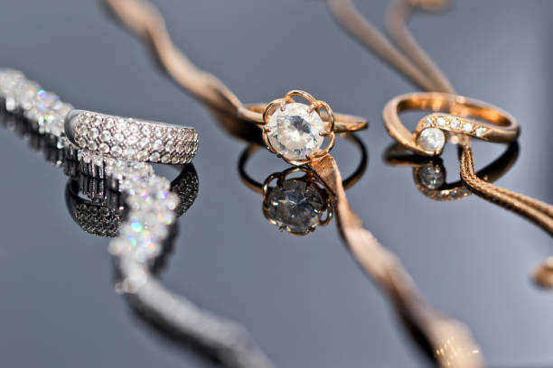 istock gold rings with diamonds, pearls and precious stones 1007190800