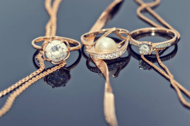 istock gold rings with diamonds, pearls and precious stones 1007193942