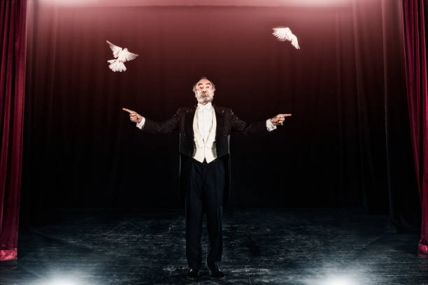 istock Magician trick with white doves 1007193956
