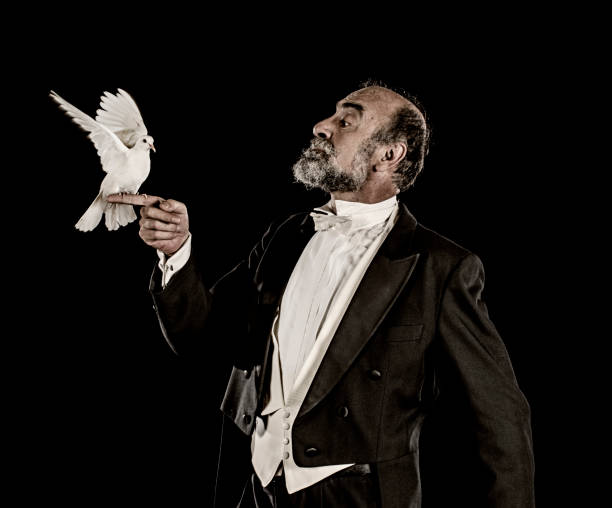istock Magician holding white dove 1007194008