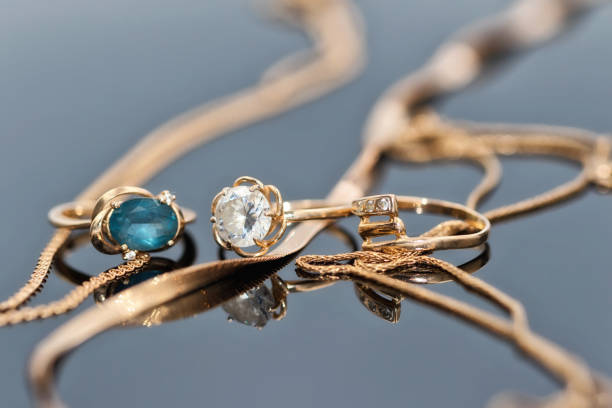 istock Gold ring with light Topaz and a thick ring with diamonds 1007194768