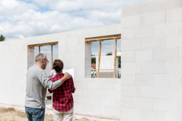 istock Couple on construction site of new house 1007197878