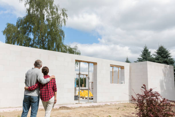 istock Couple on construction site of new house 1007197934