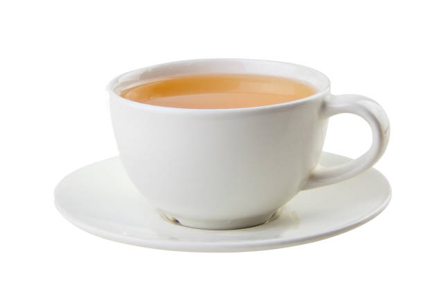 istock porcelainl cup with green tea on table 1007198154