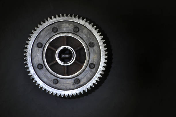 Gear on a black background. Free space for text.