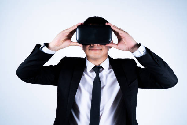 istock Goggles VR virtual reality glasses, business man in use digital entertainment 3d, background is white isolated. 1007200076