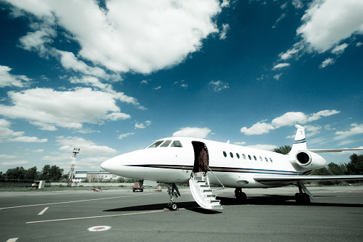 A Falcon 2000 Business Jet is fully prepared and waiting for passengers in St. Petersburg, Russia.