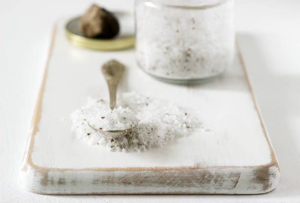 istock Sea salt with truffle and truffle on a light background. Rustic style. 1007214816