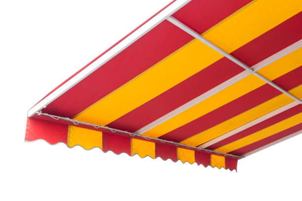 istock yellow and red striped awning with steel structure isolate on white background, with clipping path. 1007220874
