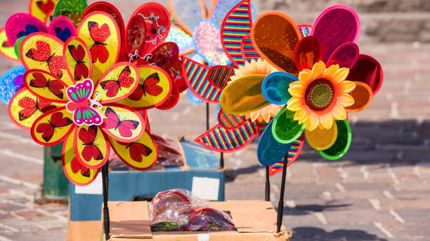 istock Many colorful flowers wind turbines 1007220882