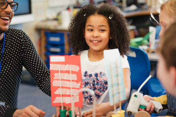 istock Elementary Schoolgirl Proud of her Work 1007227072