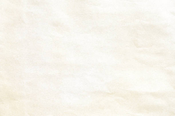 istock Old crumpled yellow  paper texture 1007227320