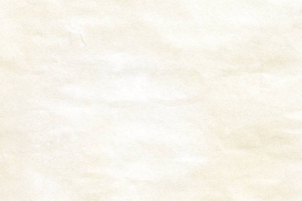 istock Old crumpled yellow  paper texture 1007227330