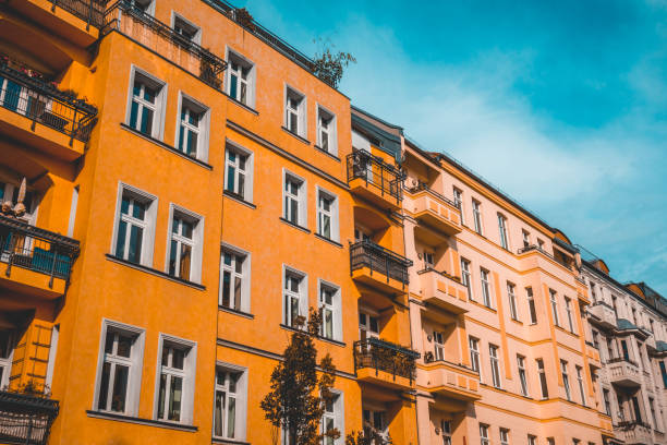 istock typical orange building at germany with darken sky 1007229778