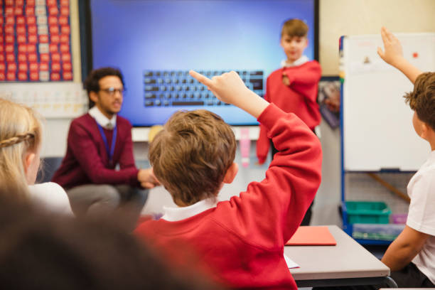 istock Presenting to the Class with his Teacher 1007229782