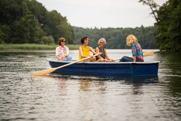 istock Females enjoying boating in forest 1007230510
