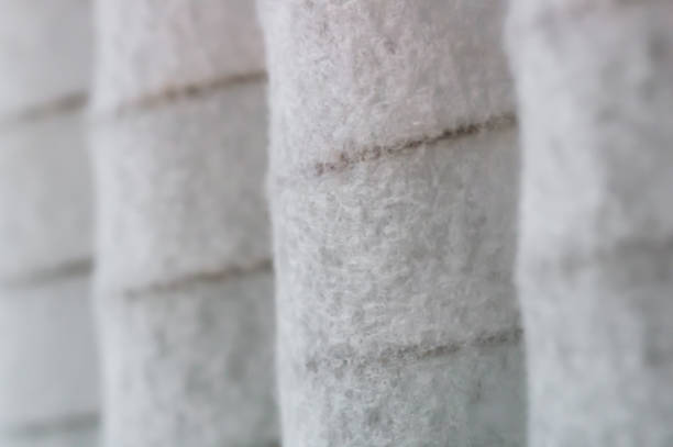 istock Pocket spring, Pocket independent spring sewn in white span-bond, industry concept 1007230704