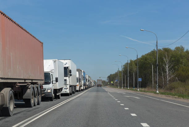 istock Lorry trucks in traffic jam on highway 1007234856
