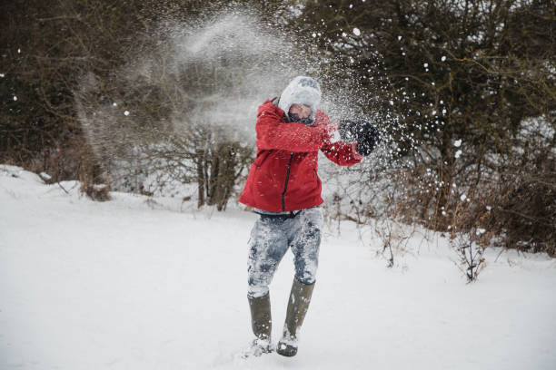istock Teenage Boy Hit with a Snowball 1007235424