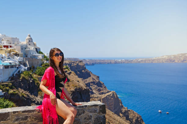 istock Young woman on Santorini, Greece 1007242170