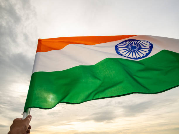 istock The wavy Indian flag on the sunset sky. Indian independence day. 1007247630