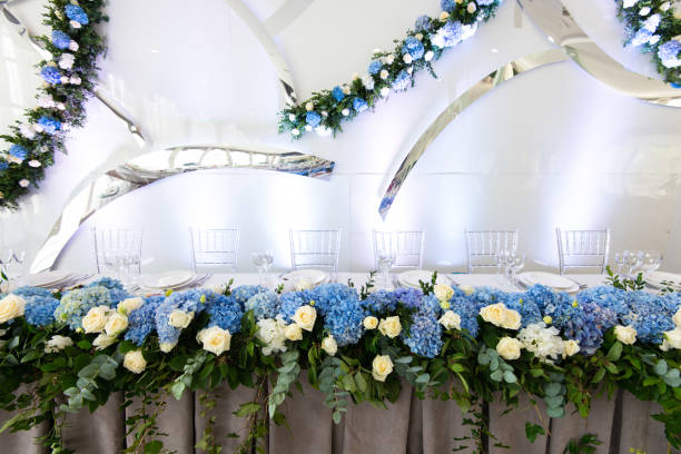 istock Banquet table is decorated with compositions of hydrangea flowers and greenery 1007250210